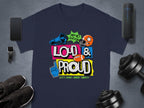 A navy blue football T-shirt from Garment Graphics features Hey Ho Lets Go! Loud & Proud with a megaphone, helmet, foam finger, and football. Surrounded by smartwatch, smartphone, earbuds, black sneakers, and weights. Show your passion with family sizing options available.