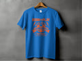 Garment Graphics’ blue t-shirt features bold orange Born to Play text on a gray background. A football graphic sits below, with Young Squad Football and the motto Kick. Score. Celebrate. Its ideal for true football dreamers and enthusiasts.