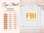 A white crewneck sweatshirt by Garment Graphics reads FBI Female Boob Inspector in bold yellow letters. A size chart next to it shows unisex Gildan 18000 sizing, available from S to 5XL.
