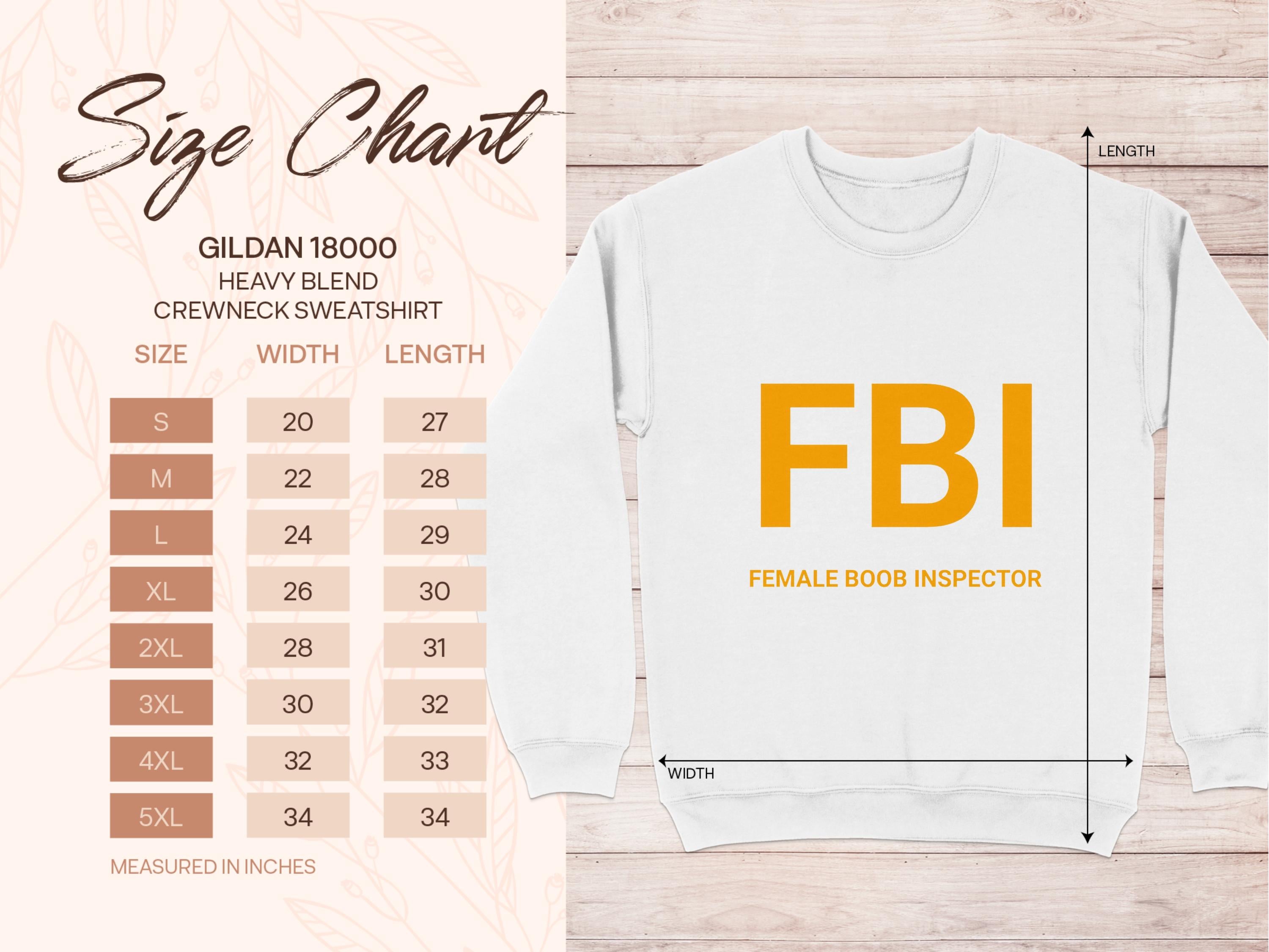 A white crewneck sweatshirt by Garment Graphics reads FBI Female Boob Inspector in bold yellow letters. A size chart next to it shows unisex Gildan 18000 sizing, available from S to 5XL.