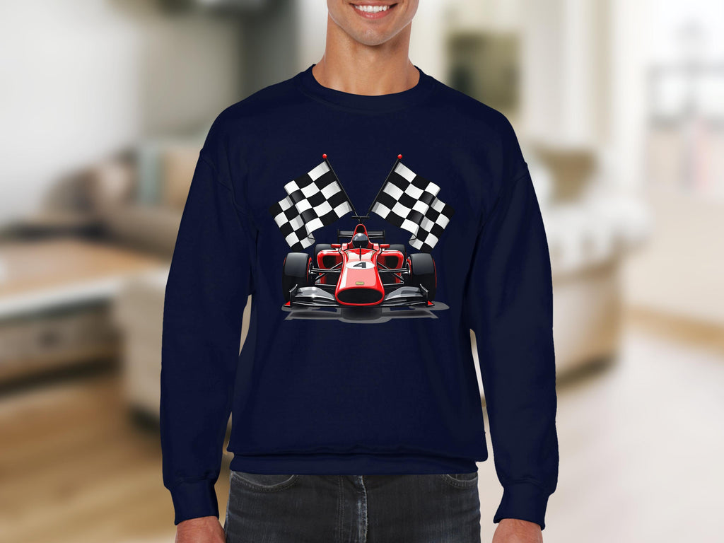 A motorsport enthusiast in a Garment Graphics navy blue sweatshirt showcases a striking red racing car graphic with two checkered flags, while the softly blurred indoor backdrop enhances its dynamic design.