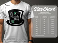 A person wears a white Garment Graphics T-shirt featuring a black top hat, shamrocks, and the text St Patricks Day. To the right is a size chart for Gildan 5000 T-Shirts showing dimensions in inches.
