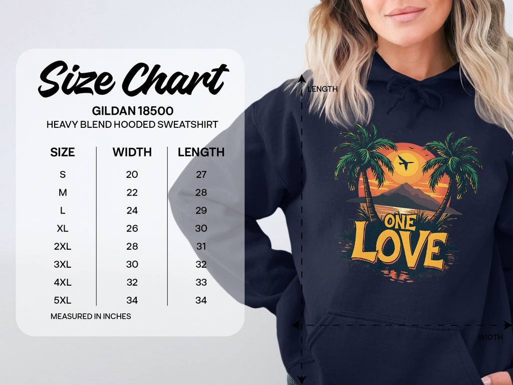 A woman wears a Garment Graphics navy hoodie featuring a tropical sunset, palm trees, and One Love. Next to her is a Gildan 18500 size chart for sizes Small to 5XL with width and length in inches. Embrace your unique style with this graphic hoodie.