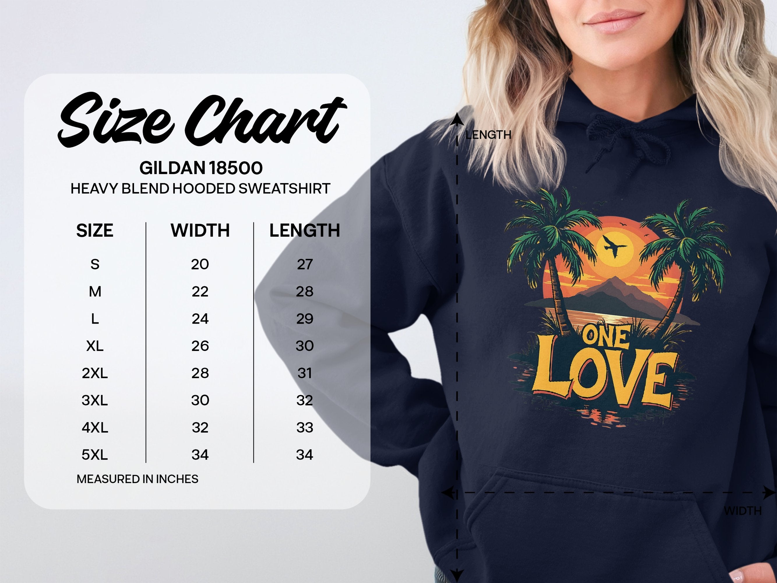 A woman wears a Garment Graphics navy hoodie featuring a tropical sunset, palm trees, and One Love. Next to her is a Gildan 18500 size chart for sizes Small to 5XL with width and length in inches. Embrace your unique style with this graphic hoodie.
