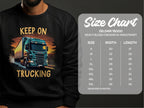 A man wears a Garment Graphics black Gildan 18000 sweatshirt with a truck design and the words Keep On Trucking. A size chart (S-5XL) provides fit guidance for these graphic sweatshirts.