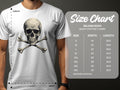 A person sports a white graphic T-shirt by Garment Graphics, featuring a skull and crossbones design—a bold fashion statement. Next to it is a Gildan 5000 heavy cotton T-shirt size chart for sizes S to 5XL, detailing width and length in inches.