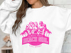 A person is wearing a white sweatshirt by Garment Graphics featuring a pink graphic of three stylized women under palm trees, with playful text that reads Always Party Beach Girl, proudly showcasing its trendy spirit.