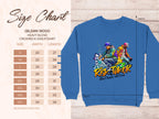 The Garment Graphics blue sweatshirt showcases vibrant street dance graphics with two dancers and Risk Taker Street Dance with Flair. The Gildan 18000 Heavy Blend Crewneck offers unisex sizing from S to 5XL, catering to urban style enthusiasts.