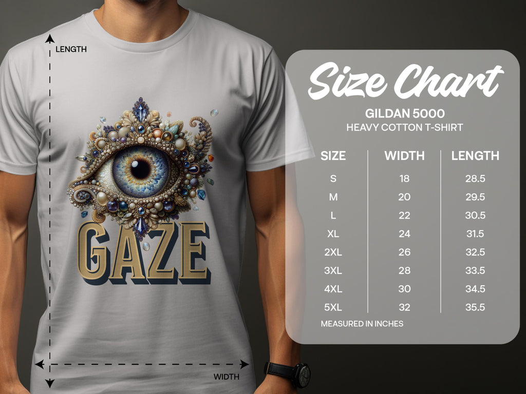 A man wears a Garment Graphics gray graphic T-shirt with a bejeweled eye design and GAZE text. Nearby, a size chart for classic-fit Gildan 5000 heavy cotton T-shirts shows sizes S to 5XL with width and length dimensions.