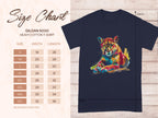 Next to a navy T-shirt featuring vibrant artwork of a colorful roaring cougar, Garment Graphics displays a size chart for the Gildan 5000 Heavy Cotton T-shirt. Sizes range from S to 5XL with corresponding width and length in inches.