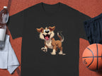 Garment Graphics presents a black T-shirt for dog lovers, featuring a cartoon dog with floppy ears and a happy expression. Styled on an orange surface, its paired with essentials—a water bottle, white towel, black shorts, and an orange basketball.