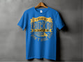 A blue t-shirt by Garment Graphics features a funny yellow and white quote: If hes got golf clubs in his truck or a camper in his driveway, dont hire him. Hanging on a hanger, its the ideal gift for those who appreciate humor and wit.