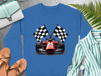 Garment Graphics offers a vibrant sweatshirt showcasing a red racing car with checkered flags, styled with a striped shirt, tan sandals, wristwatch, and a white and blue purse set against green ferns on a gray backdrop—ideal for motorsport enthusiasts.